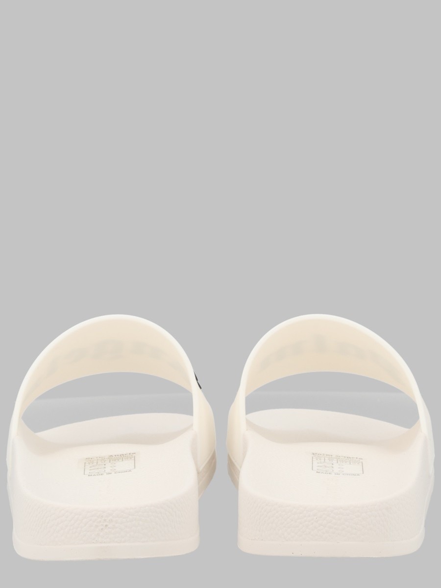 nanito_source_url:https://nokinstyle.com/2423798/slide-con-logo.jpg