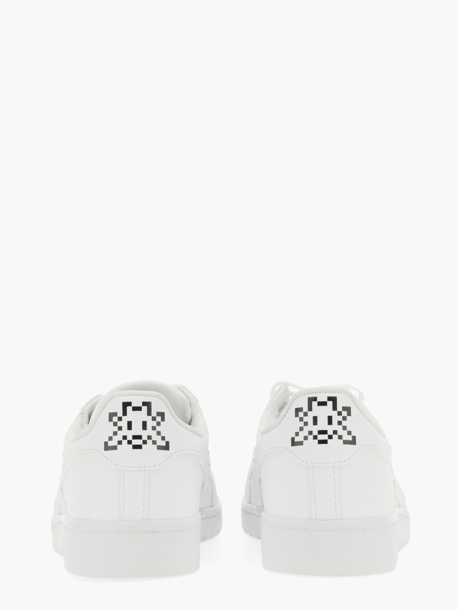 nanito_source_url:https://nokinstyle.com/2354173/sneaker-comme-des-garcons-shirt-x-asics.jpg