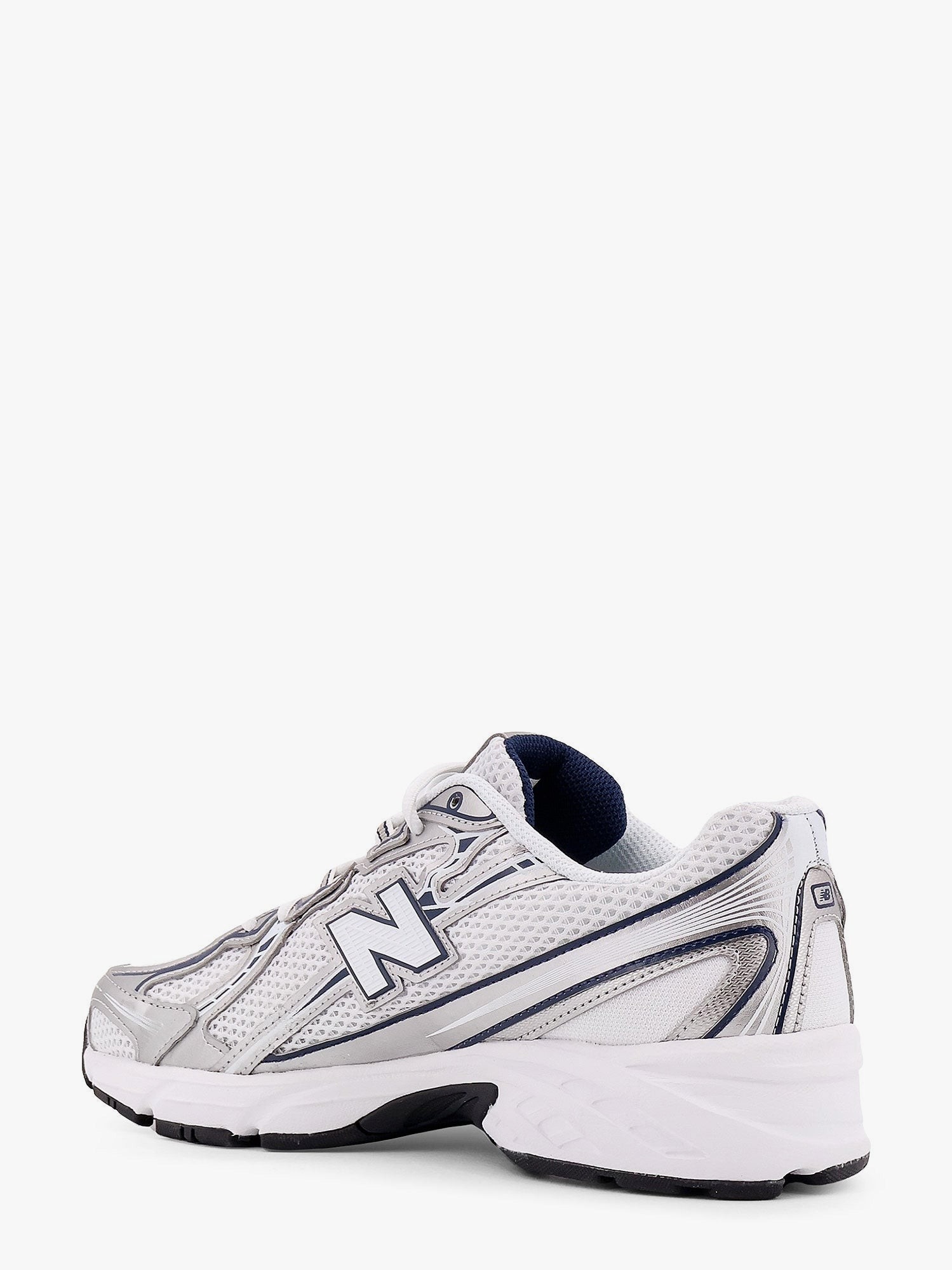 nanito_source_url:https://nokinstyle.com/2398207/740-mesh-sneakers-with-logo-on-the-side.jpg