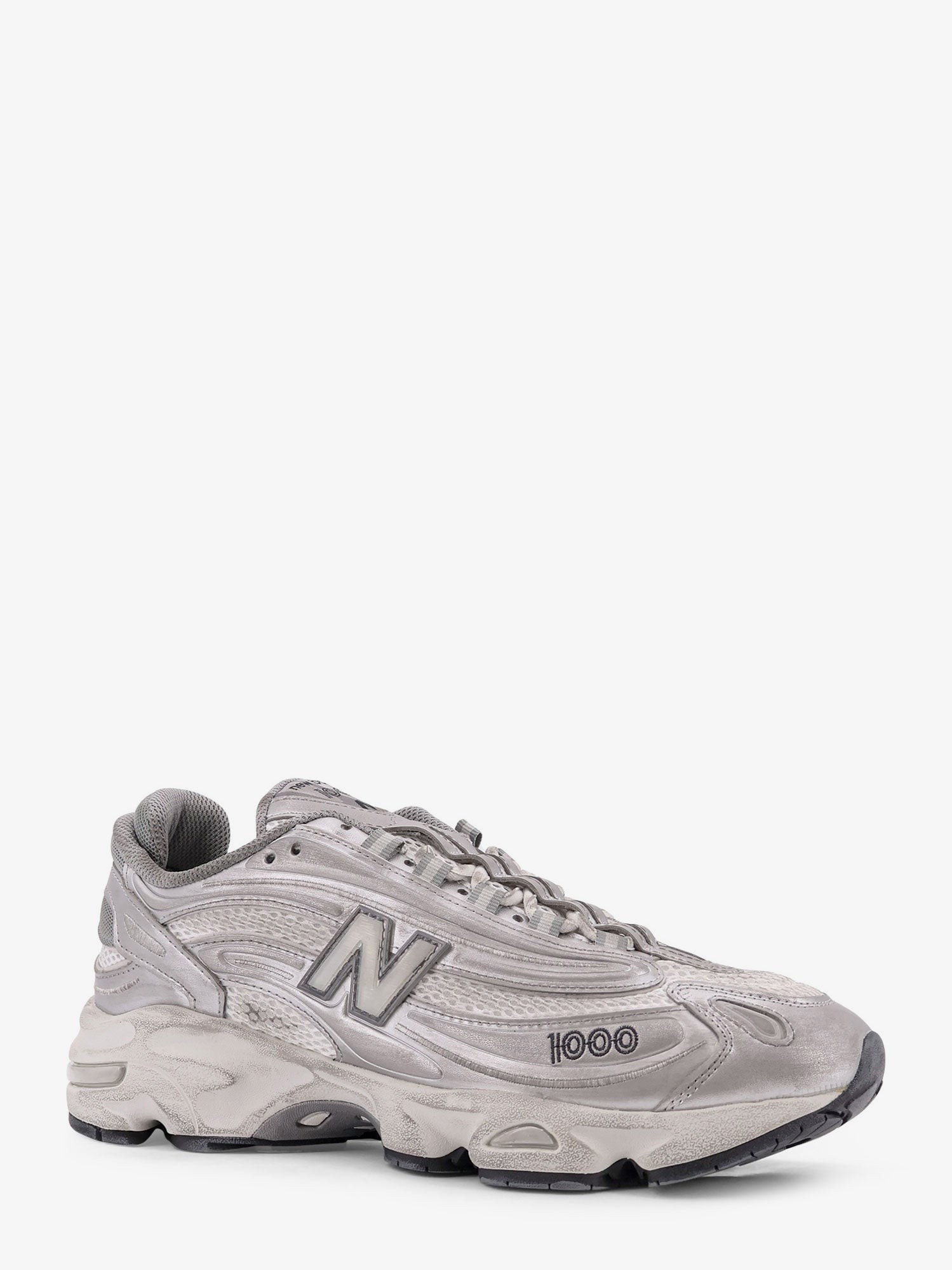 nanito_source_url:https://nokinstyle.com/2398861/1000-low-top-mesh-sneakers.jpg