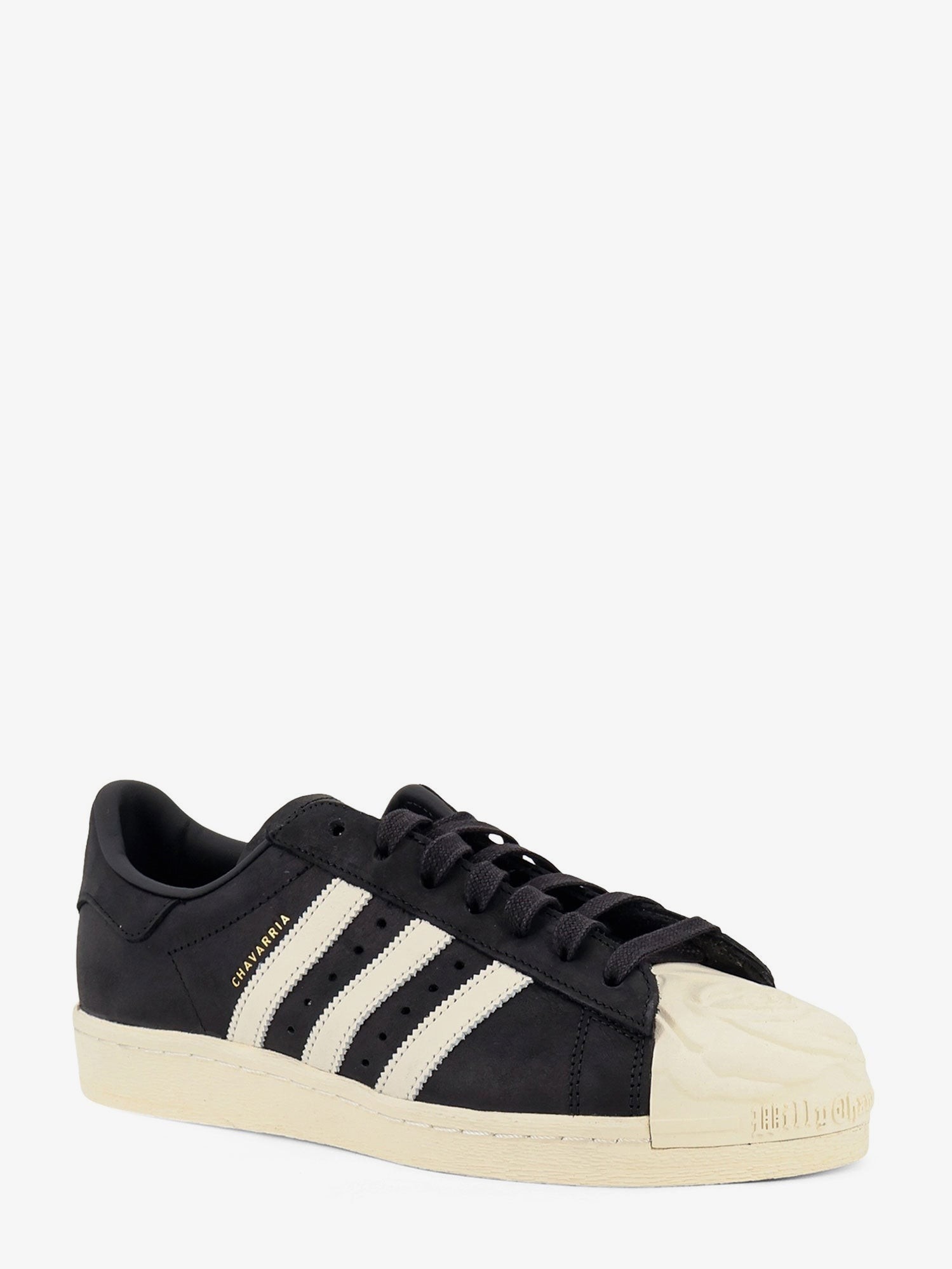 nanito_source_url:https://nokinstyle.com/2419130/leather-chavarria-superstar-sneakers.jpg