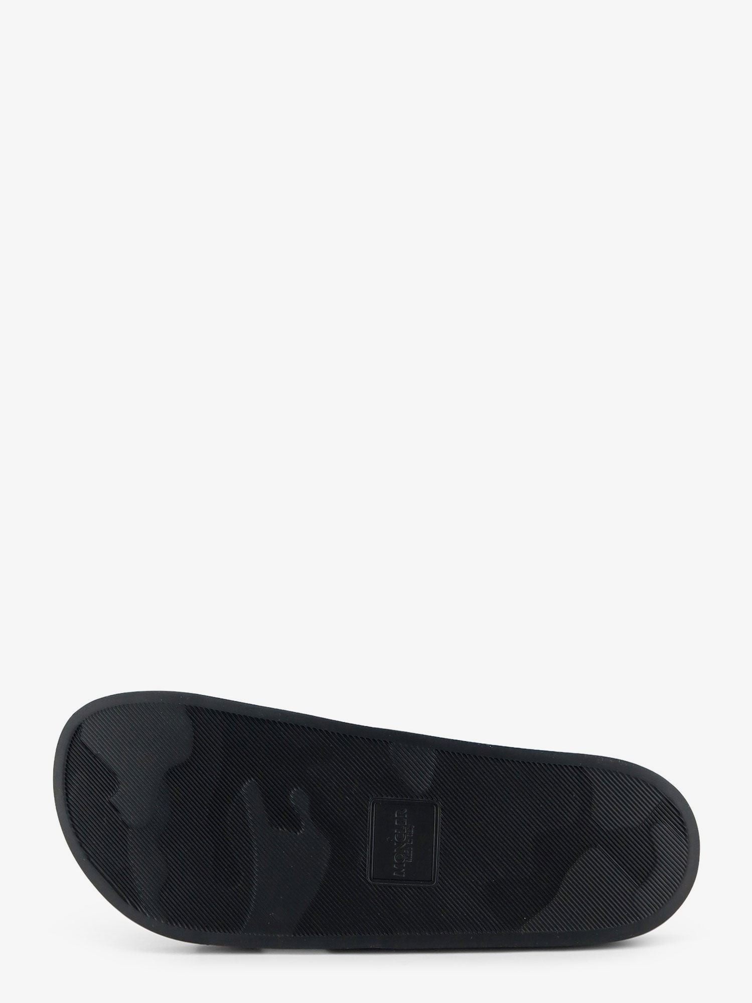 nanito_source_url:https://nokinstyle.com/2389375/basile-rubber-sandals-with-front-logo-patch.jpg