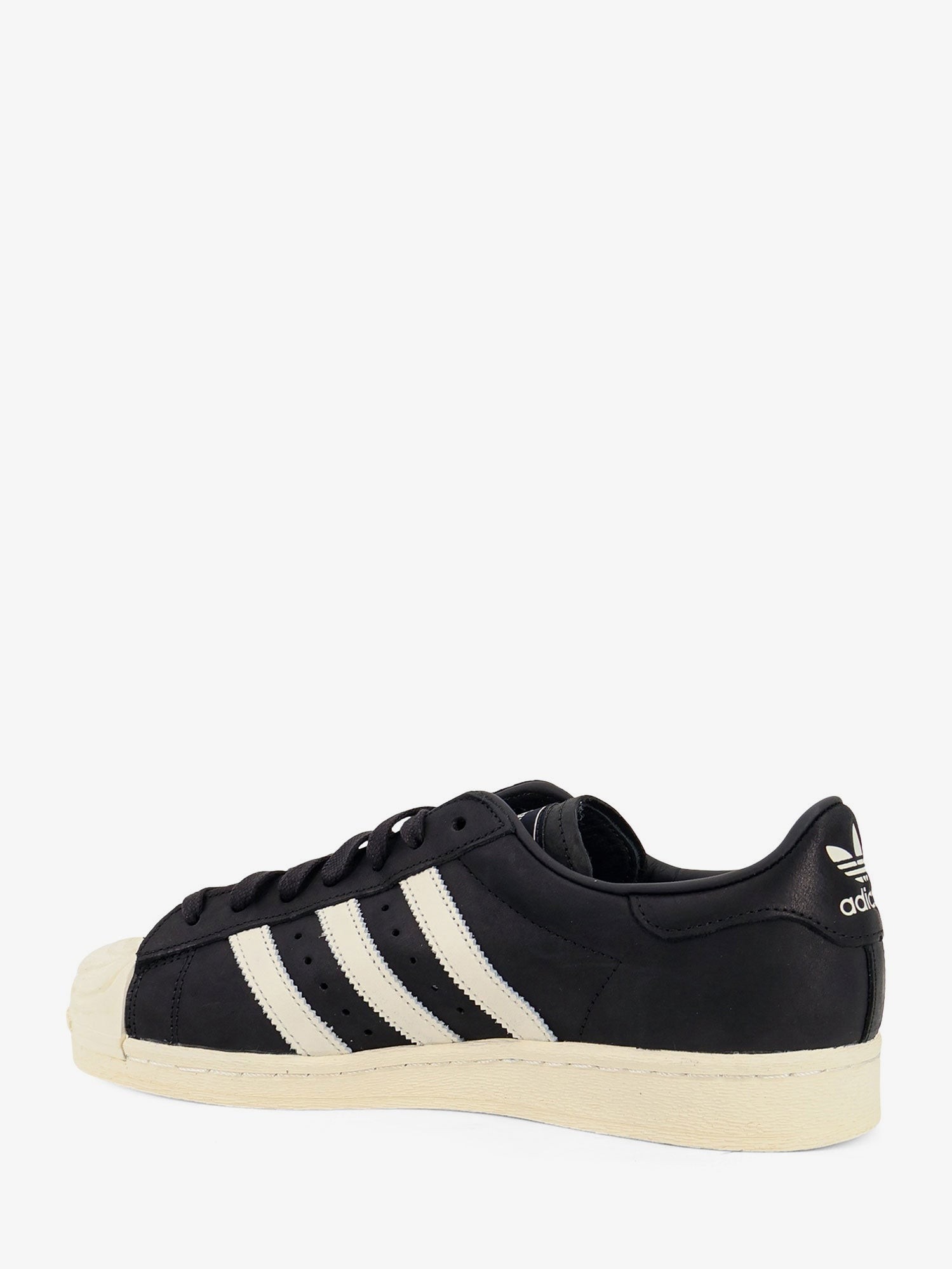 nanito_source_url:https://nokinstyle.com/2419131/leather-chavarria-superstar-sneakers.jpg