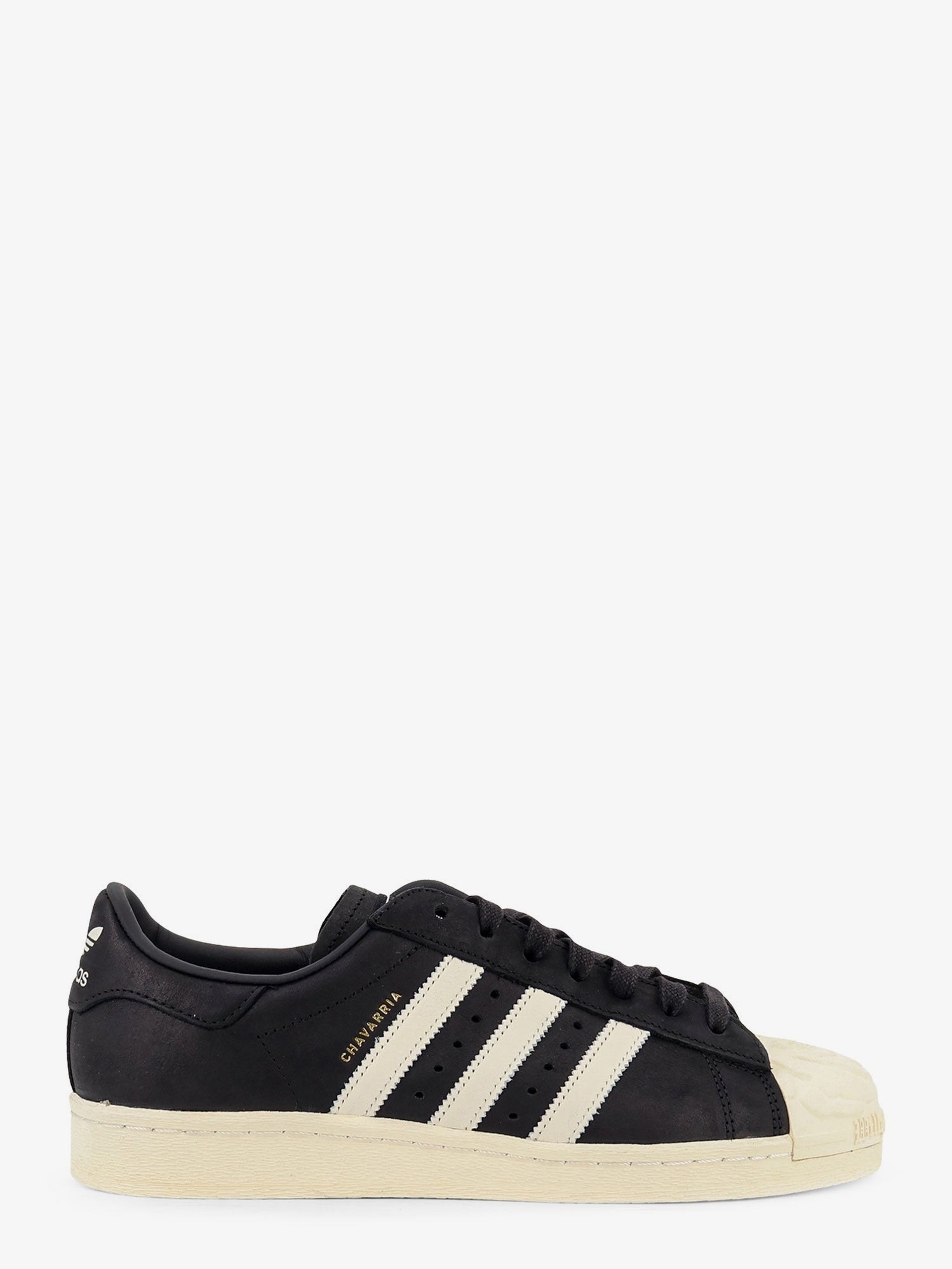 nanito_source_url:https://nokinstyle.com/2419129/leather-chavarria-superstar-sneakers.jpg