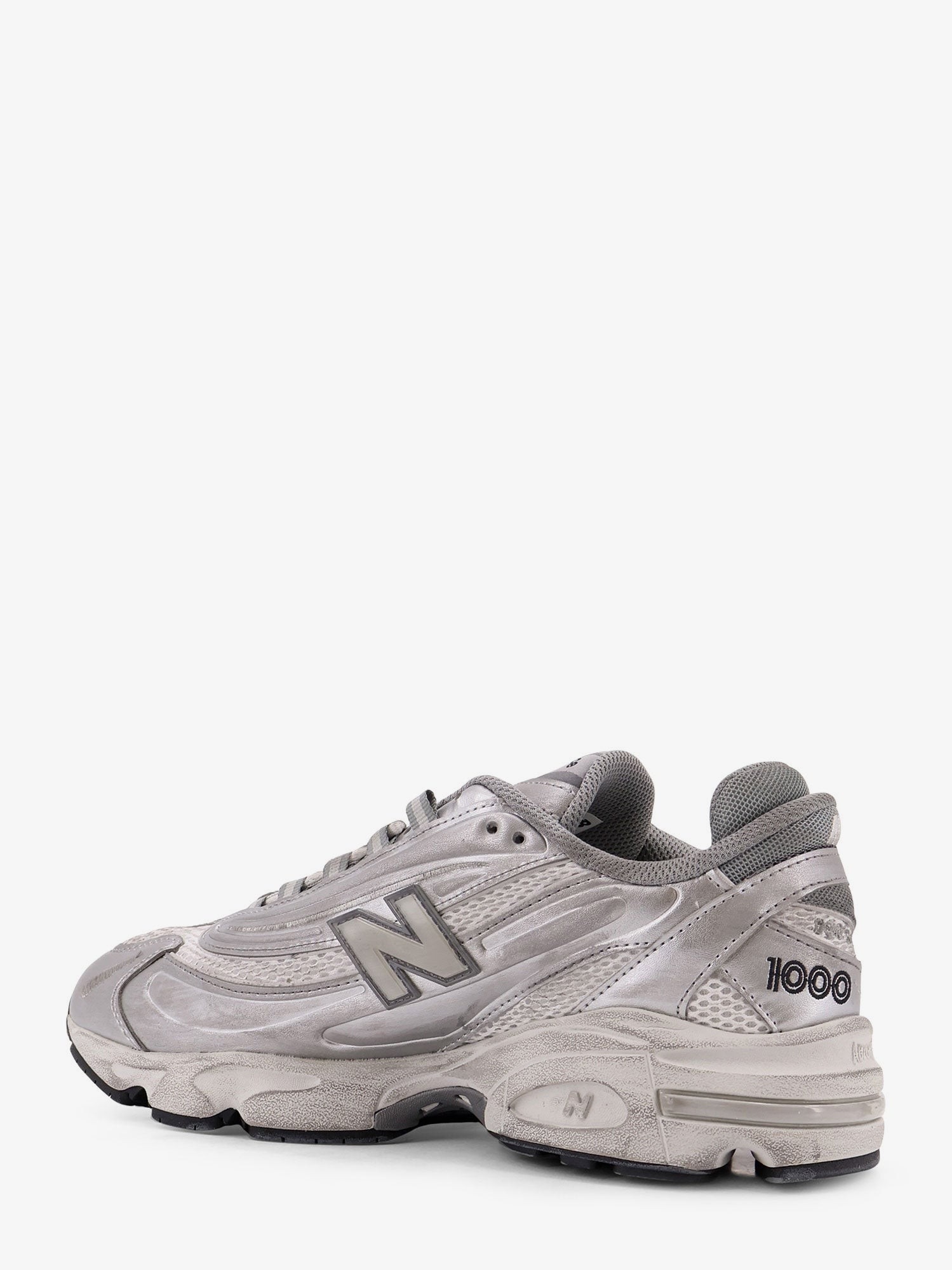 nanito_source_url:https://nokinstyle.com/2398862/1000-low-top-mesh-sneakers.jpg