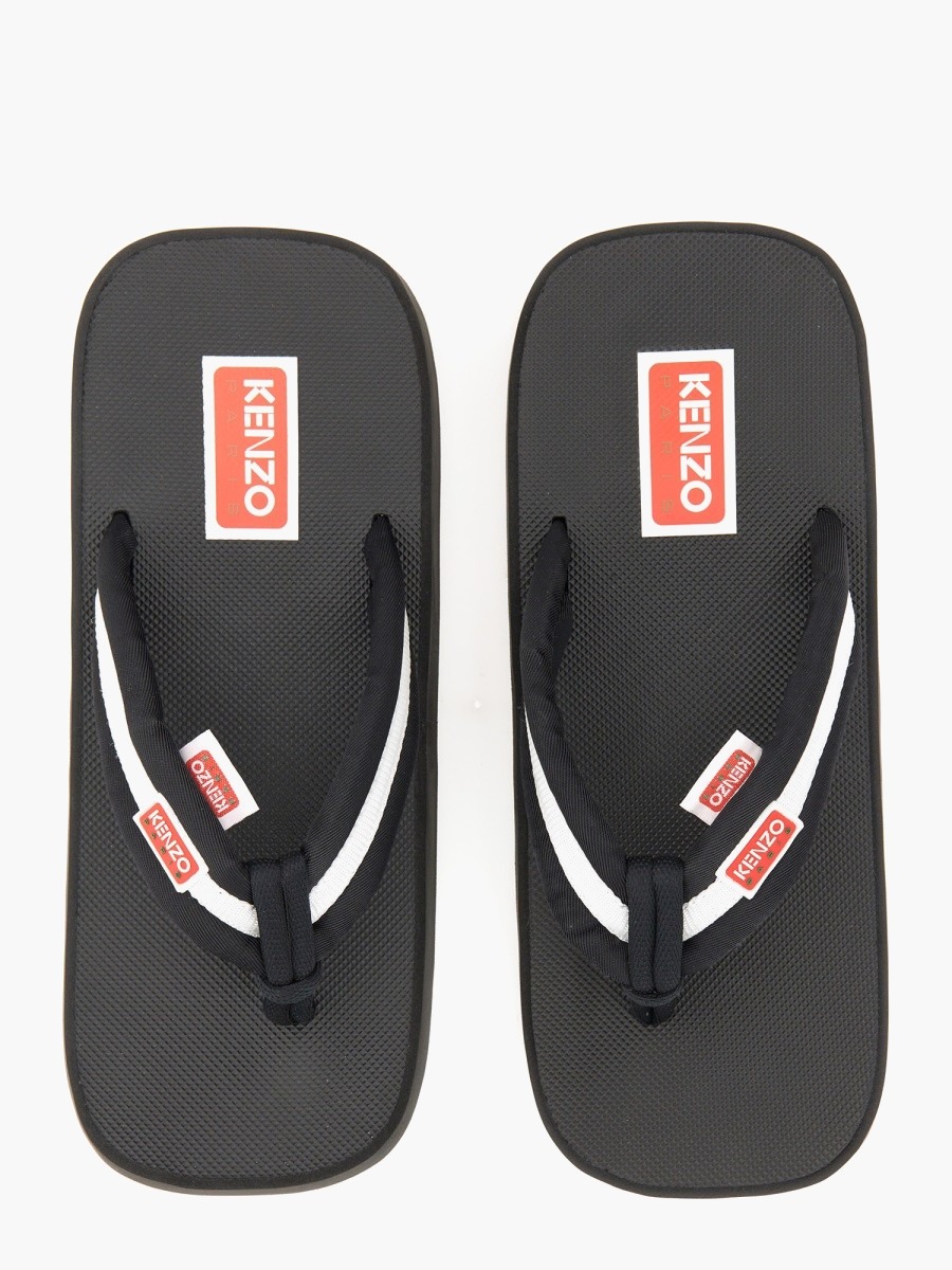 nanito_source_url:https://nokinstyle.com/2356941/slide-sandal-with-logo.jpg
