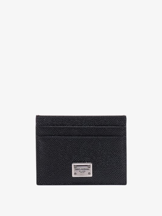 Leather card holder with metal logo tag