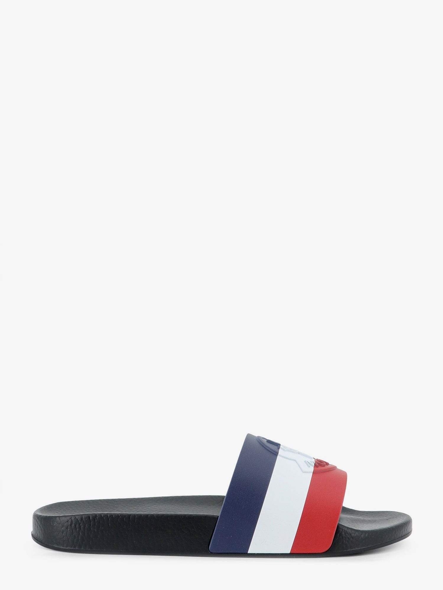 nanito_source_url:https://nokinstyle.com/2389372/basile-rubber-sandals-with-front-logo-patch.jpg