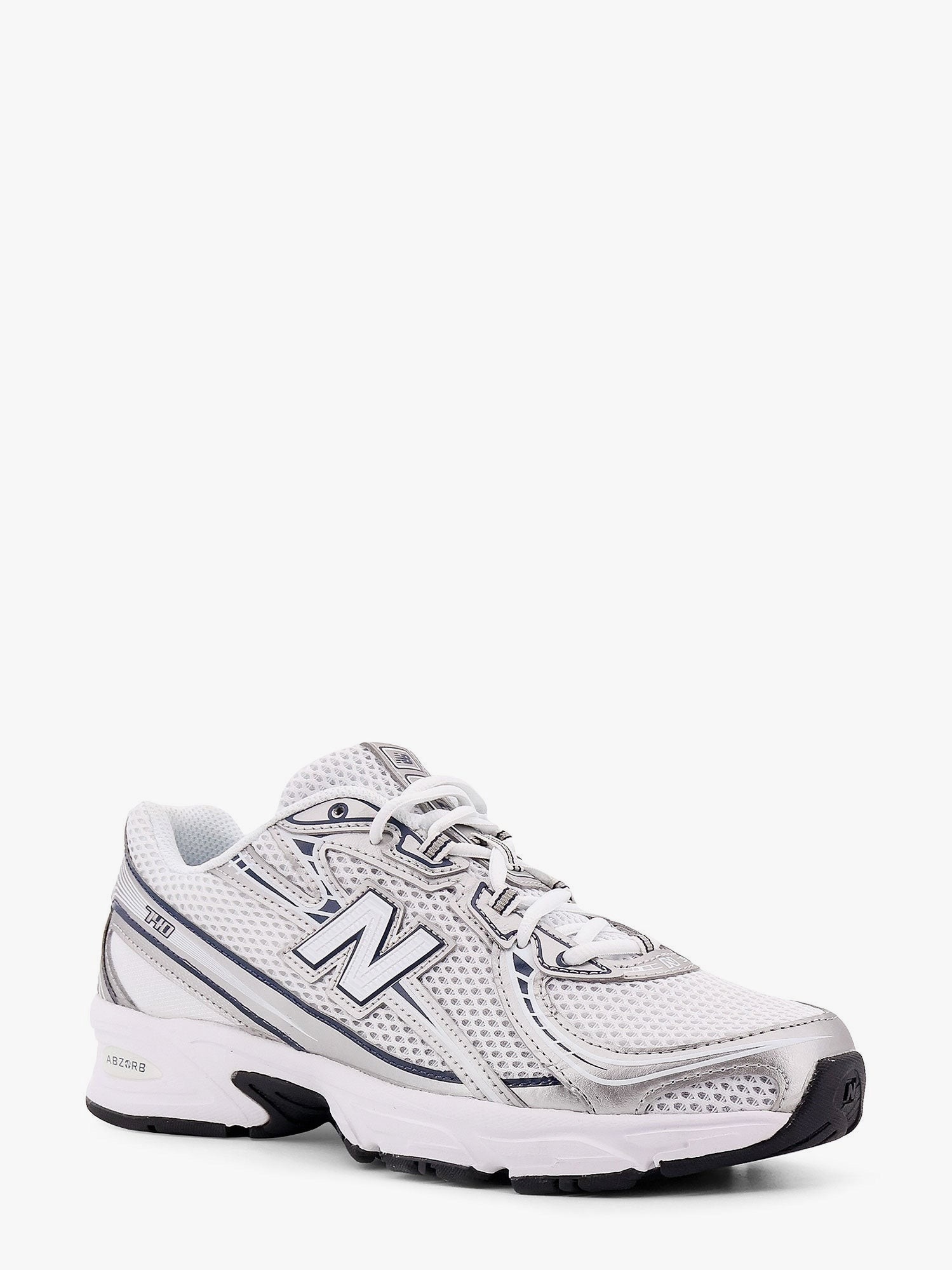 nanito_source_url:https://nokinstyle.com/2398206/740-mesh-sneakers-with-logo-on-the-side.jpg