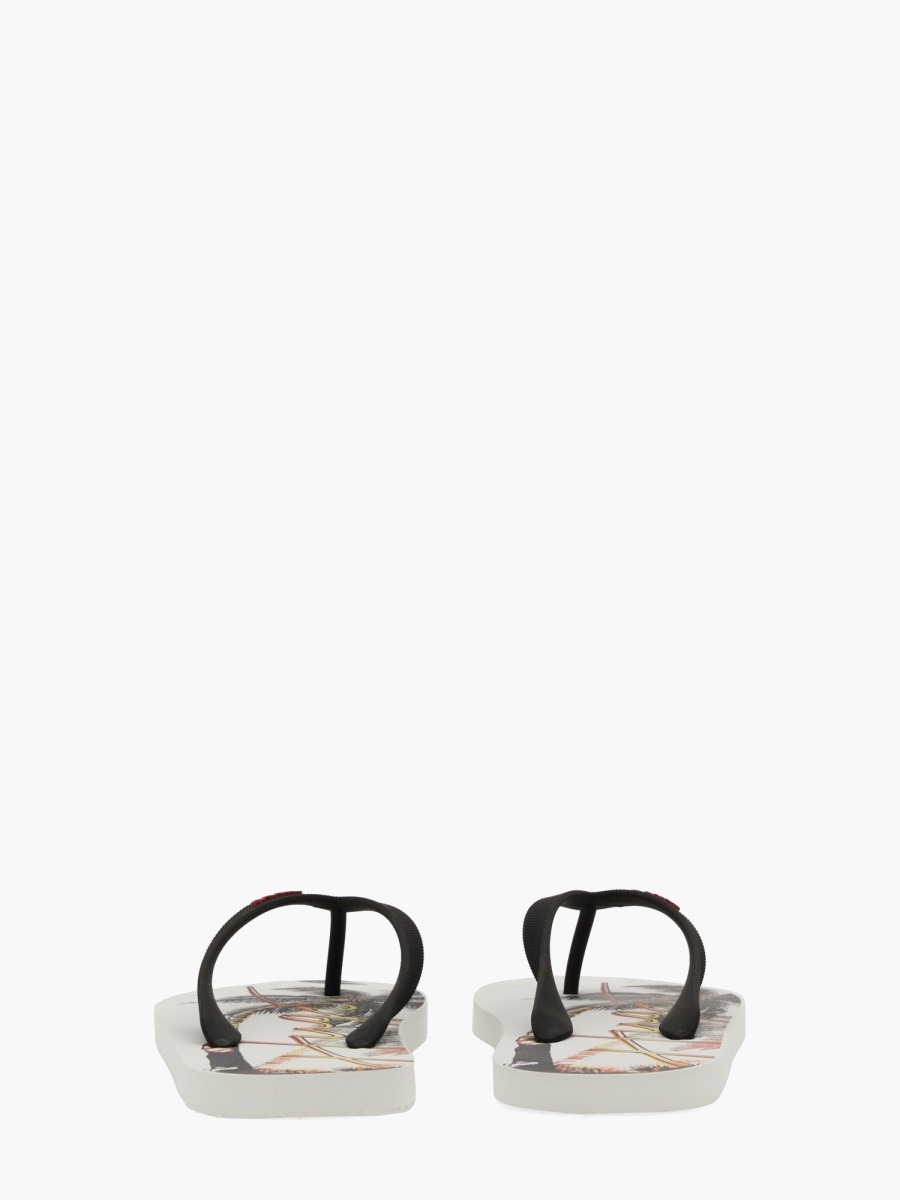 nanito_source_url:https://nokinstyle.com/2357122/slide-sandal-with-print.jpg
